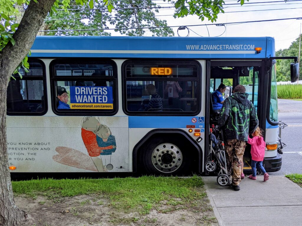Boarding bus with family