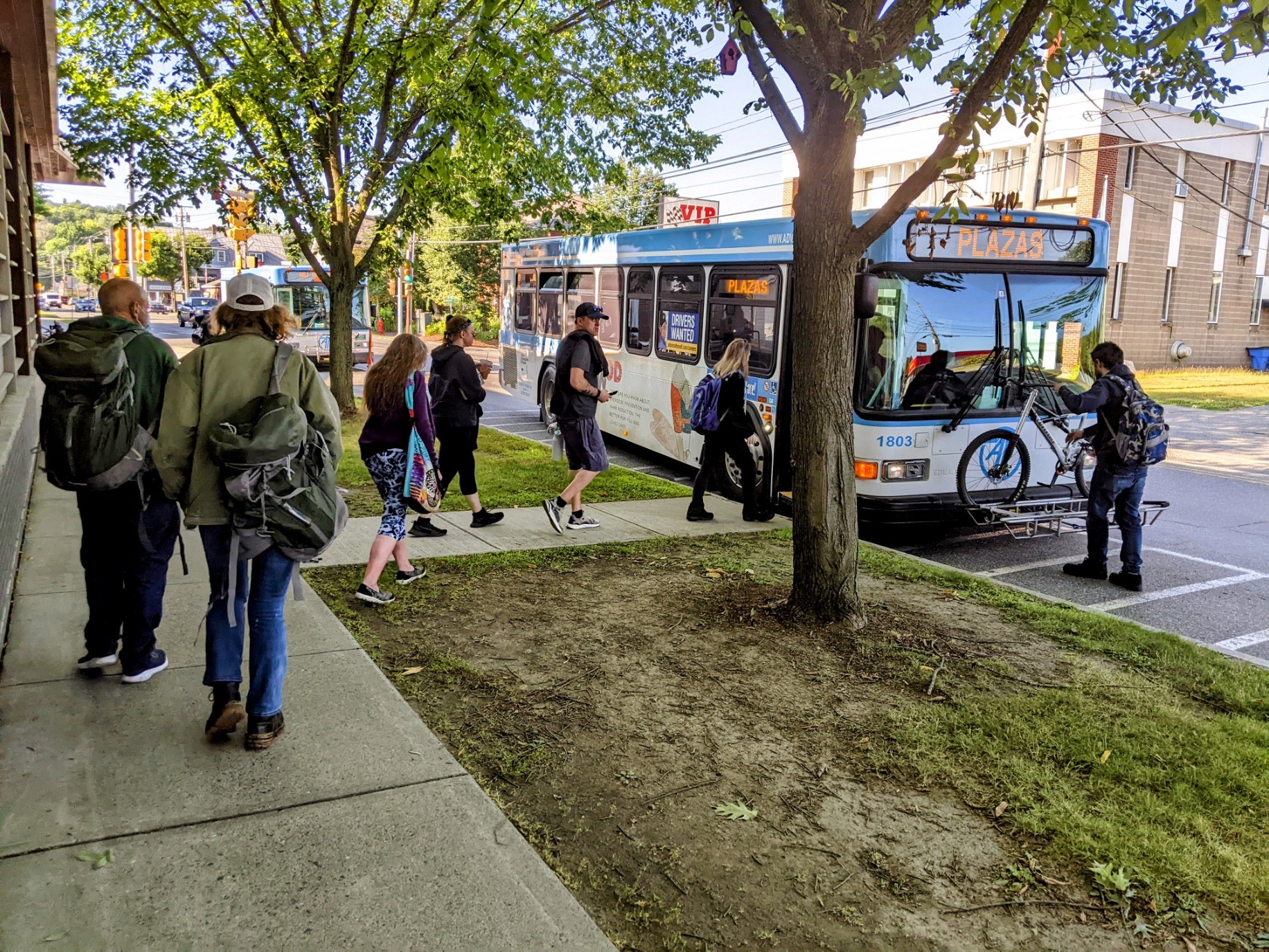 Morning commuters boarding the bus